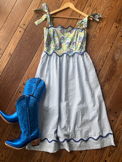 Blue Bell Dress with floral bodice, striped skirt, and blue cowboy boots from Farm Wife Threads.