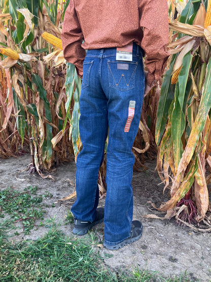 Wrangler Retro relaxed bootcut jeans for men, denim western wear in corn field, classic fit, Wrangler denim.