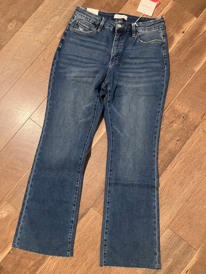 Plus size high rise tummy control bootcut jeans with raw hem